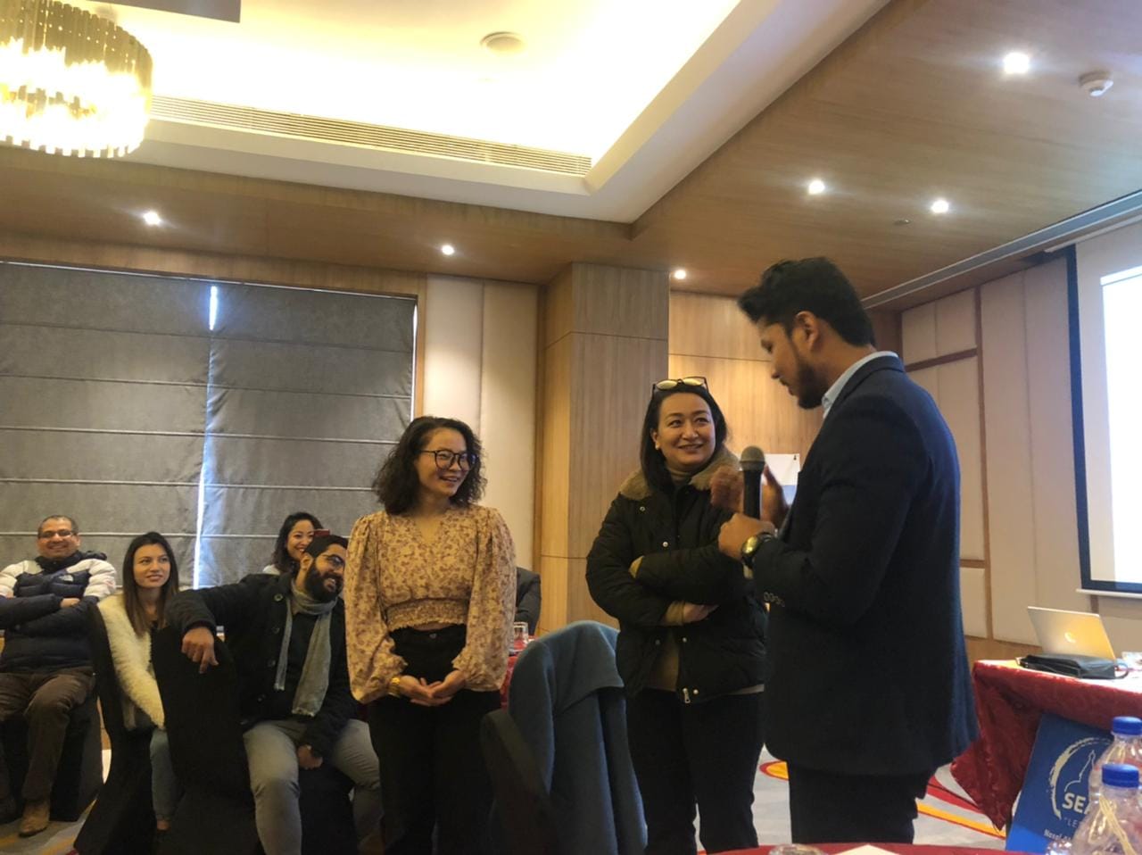 A social-emotional well-being program is a workplace initiative that aims to promote the mental health and well-being of employees.
